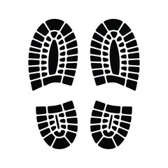 Four Black Boot Prints on White Background