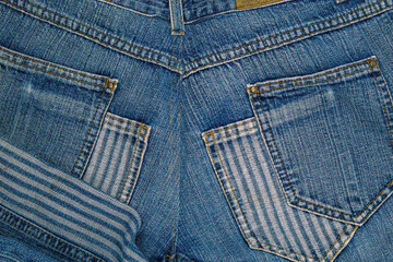 Denim jeans fabric textures and backgrounds in high resolution, showcasing blue woven patterns,...
