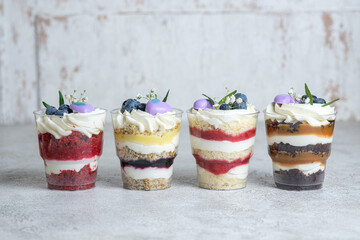 Trifles, assortment of 4 flavors: red velvet with raspberries, chocolate with caramel, vanilla with...