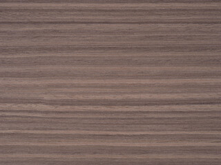 Striated waves of warm walnut traverse this veneer, showcasing a symphony of deep mocha and subtle cocoa tones
