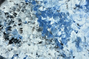 Abstract textured painting in blue, black, and white shades. Artistic background with expressive...