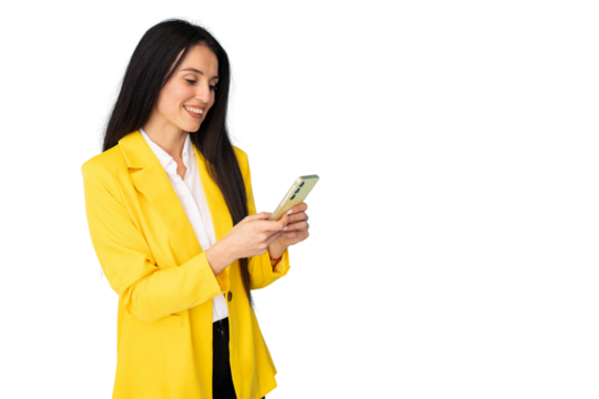 Professional businesswoman in yellow jacket texting on smartphone, white transparent backdrop