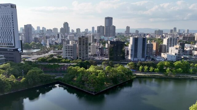 Aerial view of Osaka city skyline at sunset, Japan