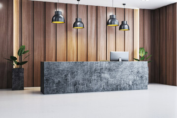Modern luxury reception desk in minimalist office lobby with wooden wall panels, pendant lights, and stone counter in corporate workspace interior. 3D Rendering