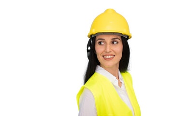 Professional female engineer wearing hard hat and safety vest, turning with confident smile, standing in industrial environment with light background