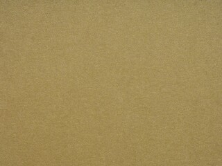 Gleaming gold paper texture whispers luxury and opulence with its vibrant, textured surface