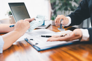 Bank approve loan to buy home concept. Real estate agent talked about terms of home purchase...