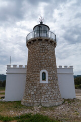 drepano lighthouse overlooking the gulf of corinth near patras, peloponnese peninsula, greece