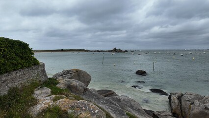 Tregastel, France – Boats by the Rugged Pink Granite Coastline