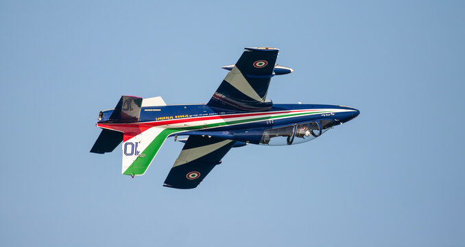 Italian Acrobatic Team "Frecce Tricolore" perform a display at an airshow.