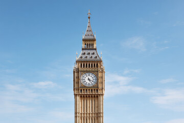 stunning view of big ben under clear blue sky emphasizing its iconic architecture