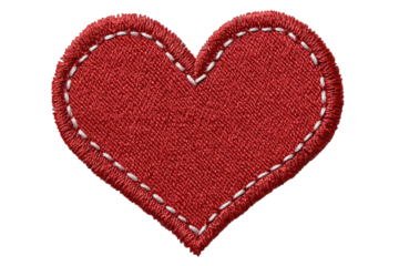Close up of a red fabric heart with white stitching on black background on transparent background