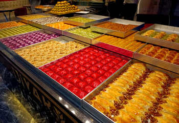 Baklava traditional Turkish dessert variation on trays on shop display