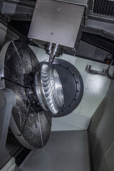 Metalworking CNC lathe milling machine. Cutting metal modern processing technology.