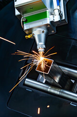 CNC Laser and gas cutting of metal, modern industrial technology.