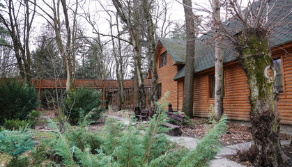 Wooden log house made of wood in the park