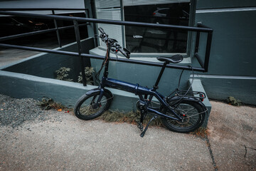 Electric bicycle new blue red color in cold fresh  morning,Juneau, Alaska,