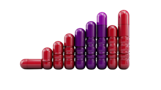 Ascending Stacked Red and Purple Capsules on White Background – Colorful Pharmaceutical Pills for Medicine, Health, and Wellness Concepts