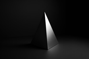 Fototapeta premium Geometric Metal Pyramid in Dramatic Lighting