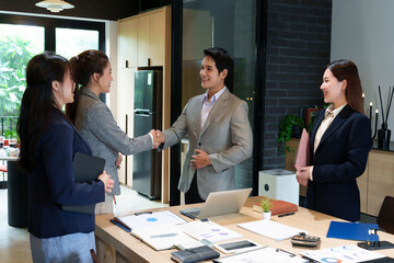 Business Meeting Handshake with Asian Business People Corporate Agreement Collaboration Successful Negotiation Partnership Deal