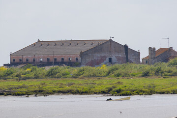 Abandoned industrial building overlooking the tagus river in lisbon, portugal