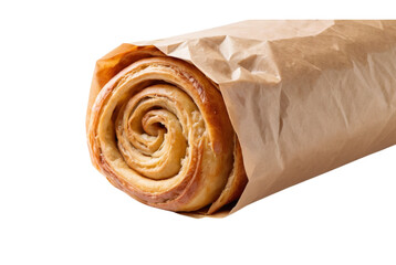 Spiral pastry partially wrapped in brown paper tempting and fresh