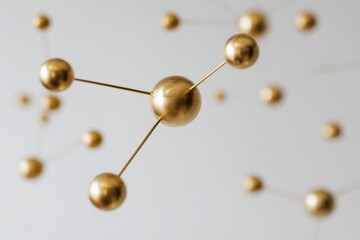 Intricate brass mobile sculpture suspended against a soft white wall captures minimalist elegance and artistic expression