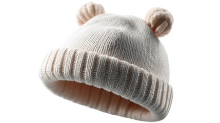 Whimsical Knitted Hat: A soft, cream-colored knitted hat, adorned with playful ear details, perfectly encapsulates the innocence and warmth of childhood. A symbol of comfort and style.