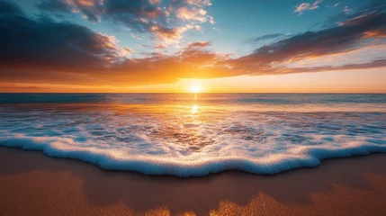 Fototapete Sonnenuntergang A breathtaking view of a sunset casting warm hues over a tranquil ocean, with gentle waves lapping at the shore, inviting serenity and reflection.  ©  Shomixer