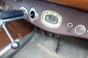 Vintage car interior with classic speedometer