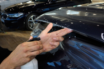 The comprehensive Car Wrap Application Process conducted within a Modern Showroom environment