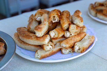 Outdoor catering buffet with a variety of food snacks and appetizers