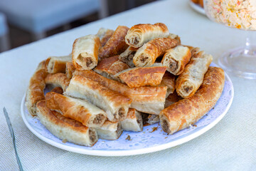 Outdoor catering buffet with a variety of food snacks and appetizers