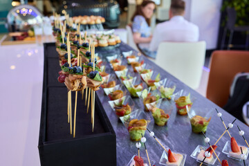 An Elegant Assortment of Gourmet Desserts and Savory Snacks Beautifully Arranged on Table