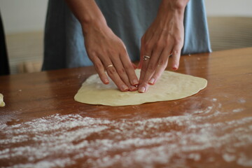 woman kneading dough