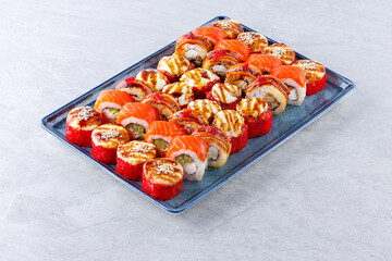 Deluxe Assorted Sushi Platter with Baked Rolls and Salmon Nigiri
