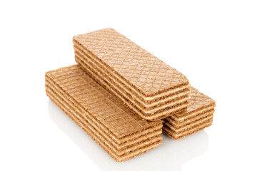 Several chocolate wafers, macro, isolated on white background.