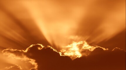 Golden light through dramatic clouded sky