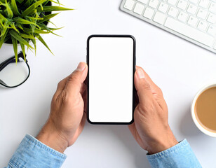 Top View of Businessman Hands Using Smartphone with Blank Screen at White Office Desk

