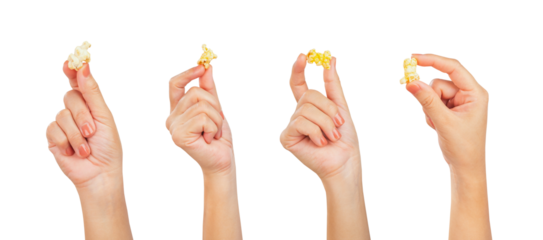 Female hand holding popcorn isolated on white background.
