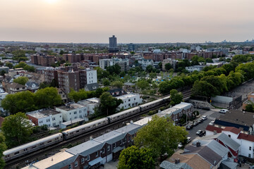 A train on the tracks, moving forward.