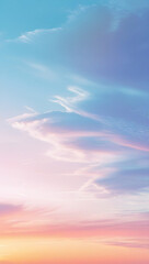Fototapeta premium A serene sky with soft pastel gradients blue to pink to orange featuring wispy clouds, evoking a calm sunset or sunrise.