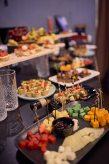 An Elegant Assortment of Gourmet Desserts and Savory Snacks Beautifully Arranged on Table