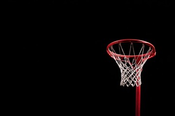 A Red Netball Hoop Under The Bright Lights