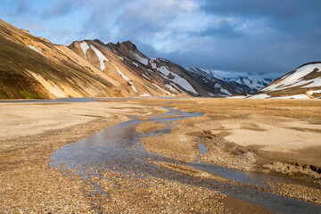 Sunset at Landmannalaugar in Iceland with colorful mountains in background