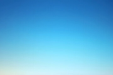 Calm blue gradient background with soft transitions of color from dark to light hues