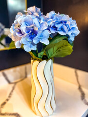A bouquet of flowers in vase