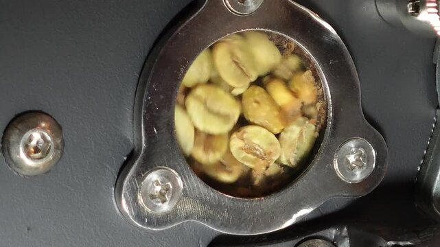 Raw coffee roasted bean stiring