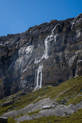 Waterfalls cascading down a rocky mountainside in Ordesa y Monte Perdido National Park