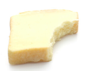 White bread croutons with salt on a white background